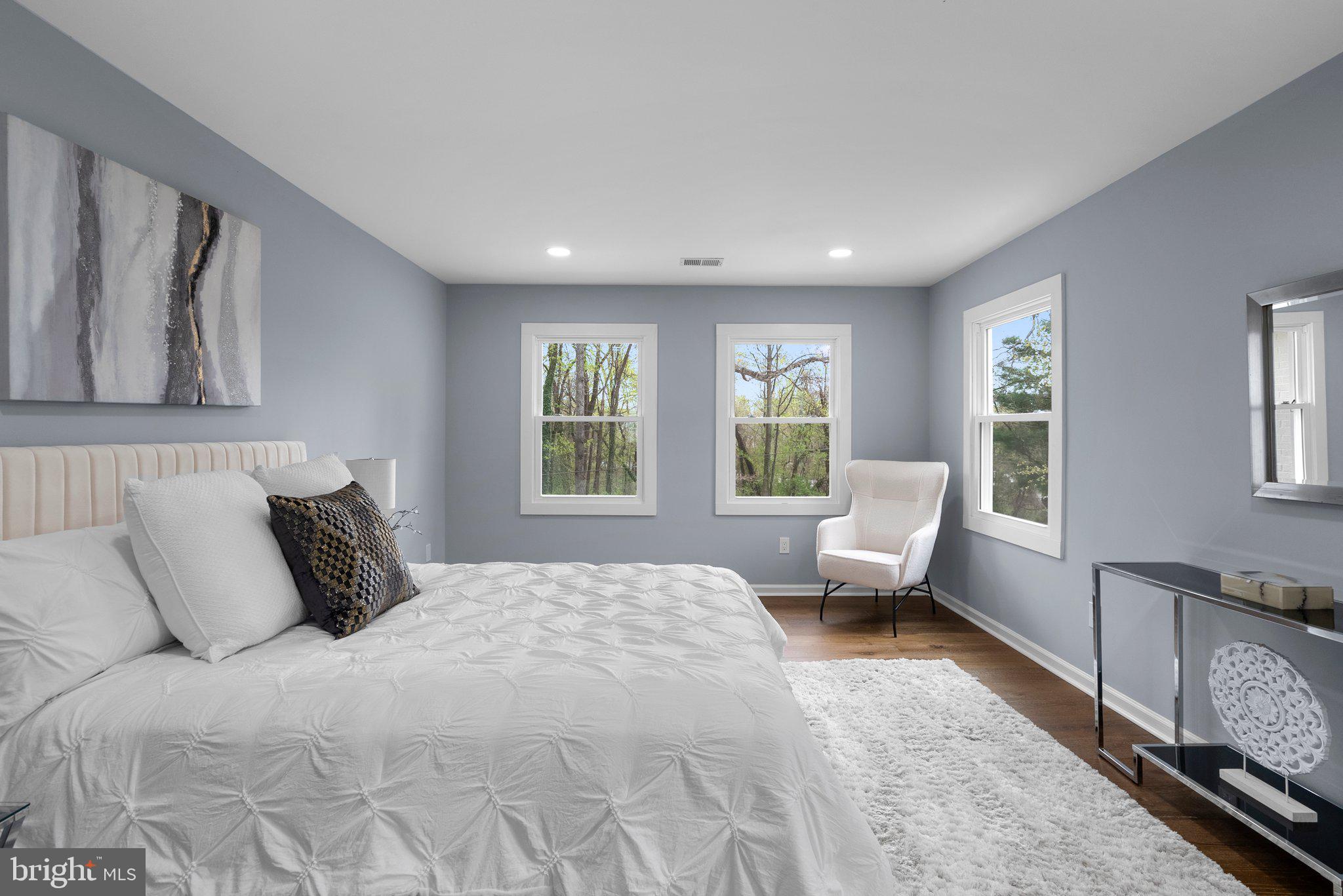 2924 Hunter Road Fairfax, VA 22031 - Photo 24 of 79 a bedroom with a large bed and a window