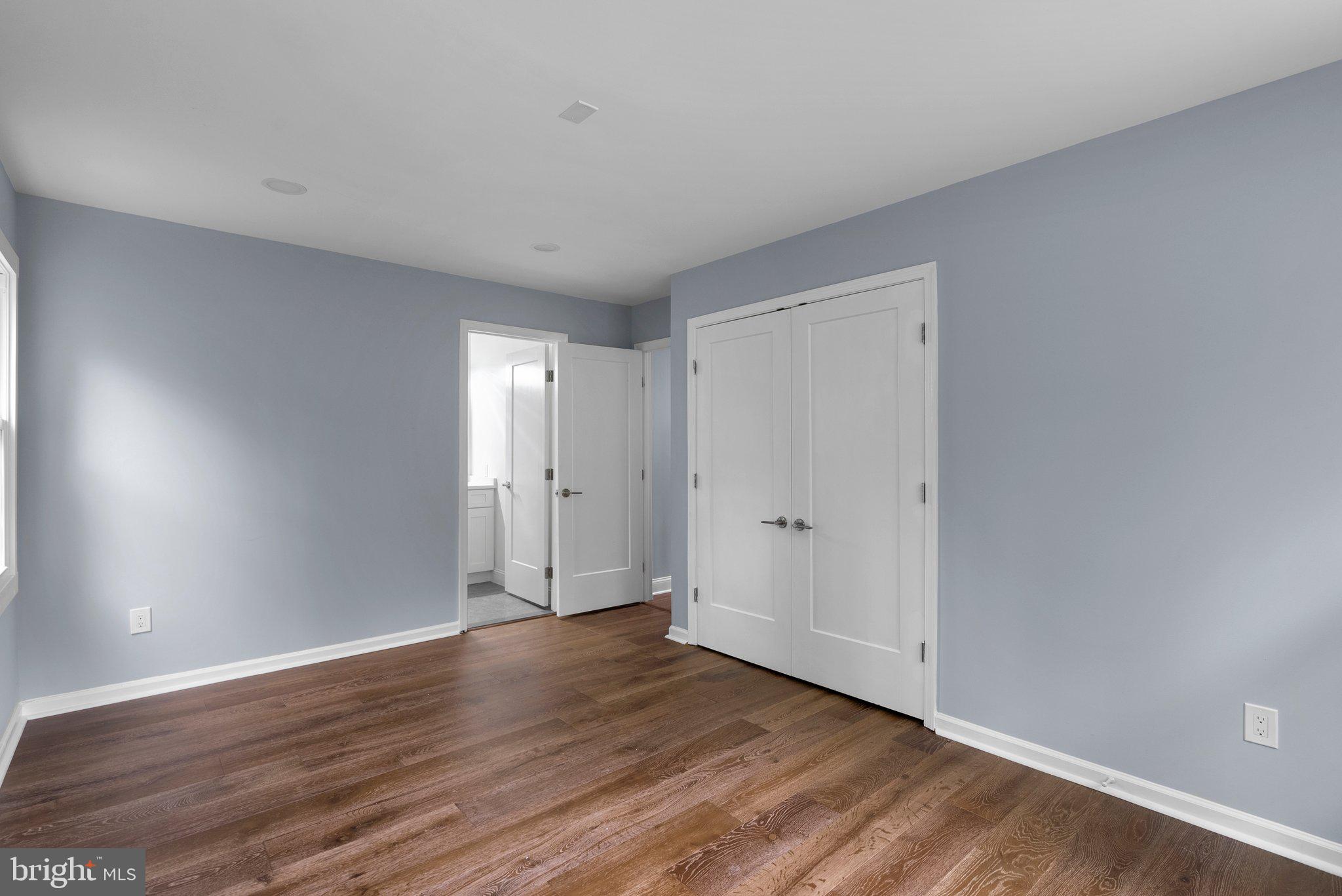2924 Hunter Road Fairfax, VA 22031 - Photo 36 of 79 a view of an empty room with wooden floor