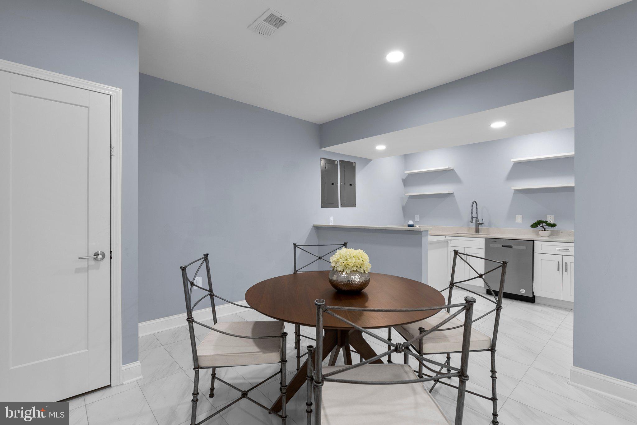 2924 Hunter Road Fairfax, VA 22031 - Photo 45 of 79 a view of a dining room with a table and chairs