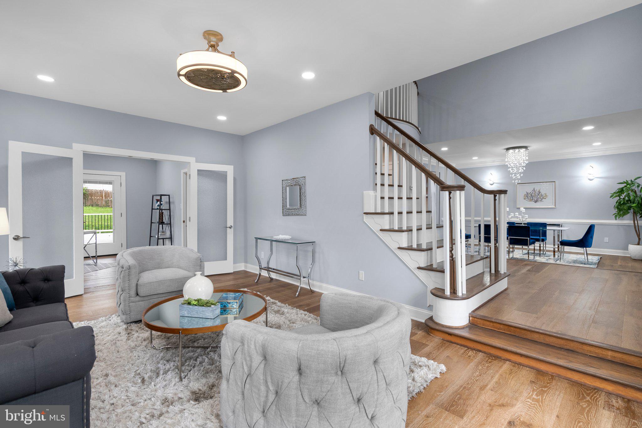 2924 Hunter Road Fairfax, VA 22031 - Photo 5 of 79 a living room with furniture and a chandelier
