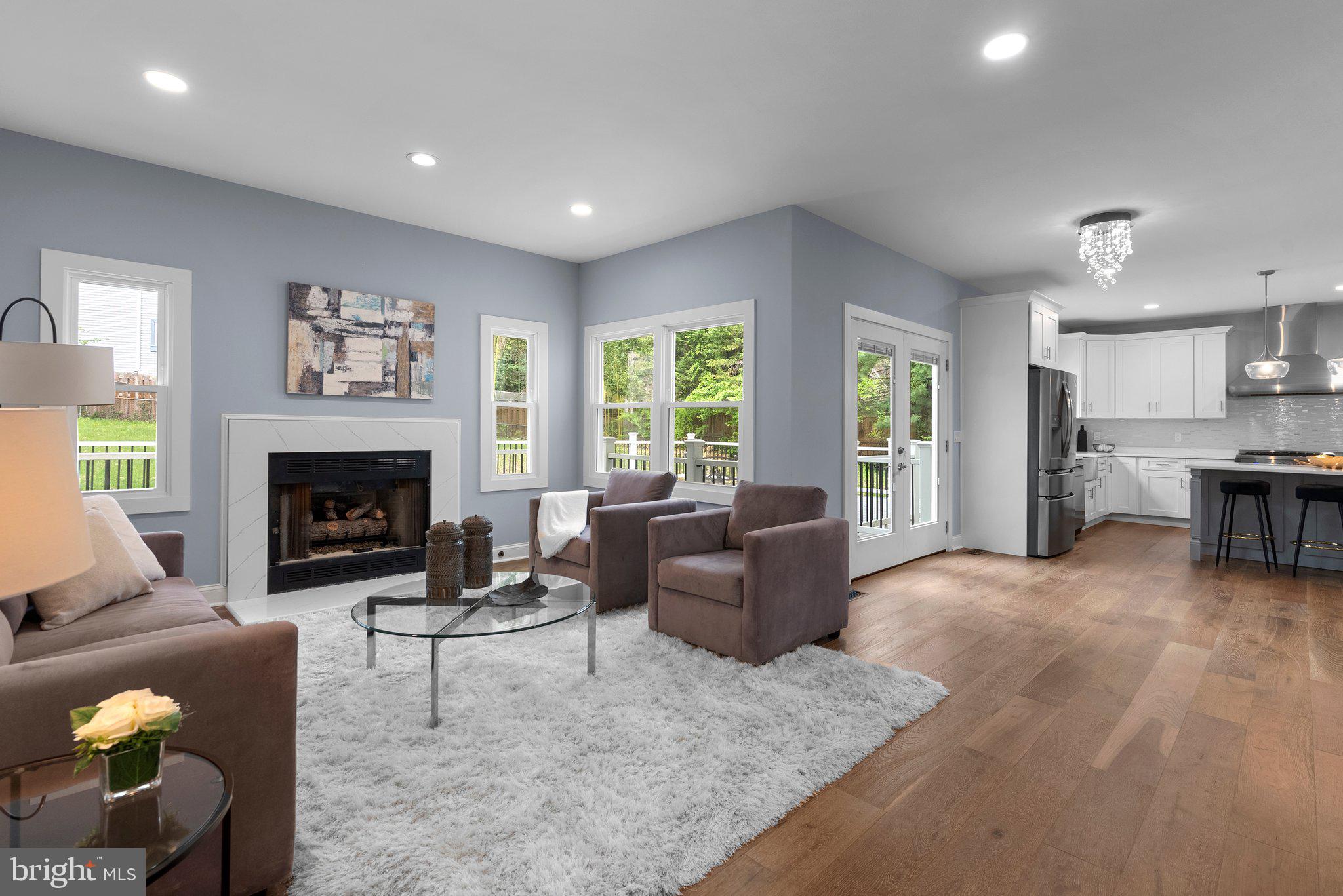 2924 Hunter Road Fairfax, VA 22031 - Photo 10 of 79 a living room with furniture and a fireplace