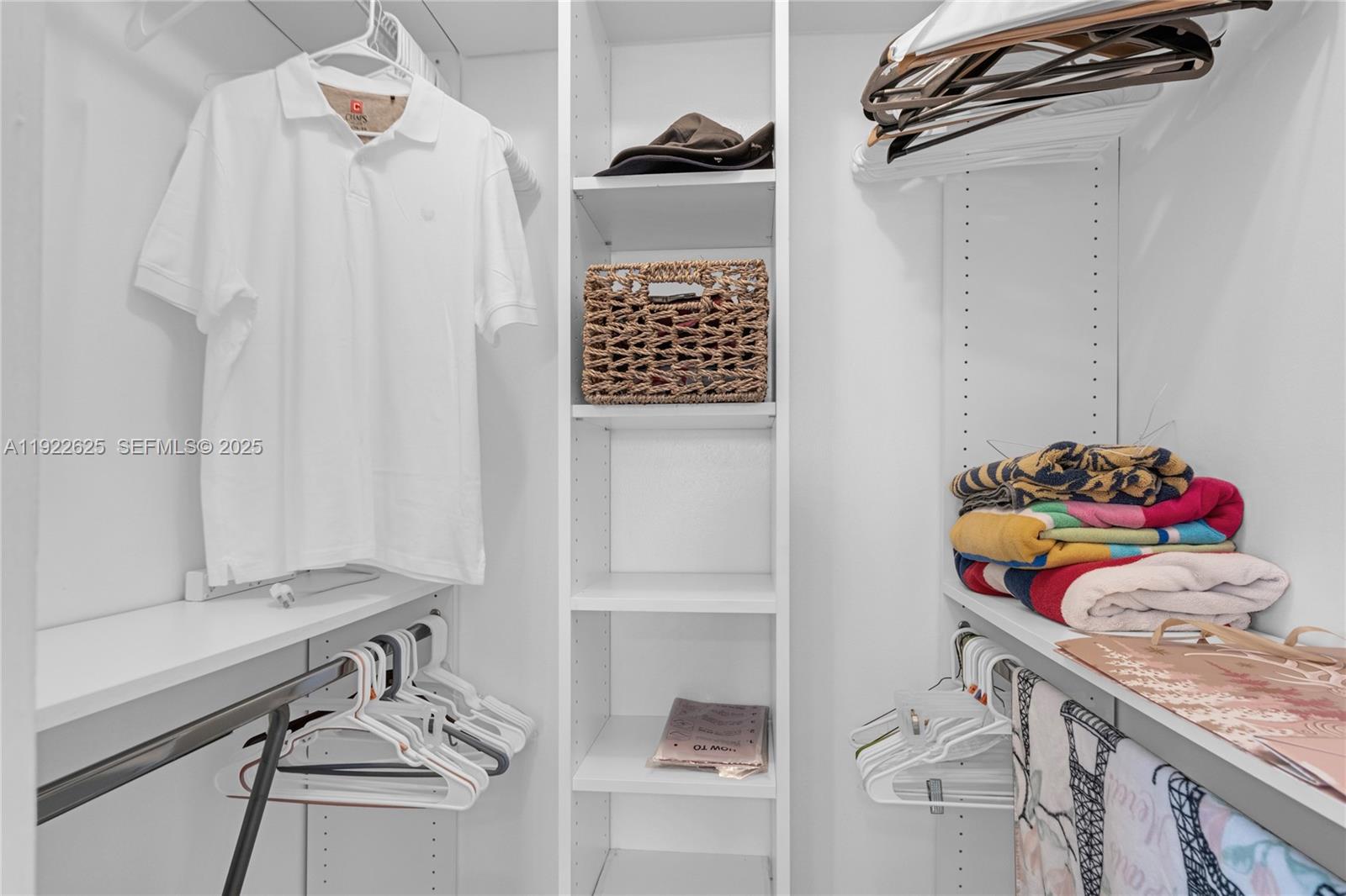 400 North Surf Road, Unit 506 Hollywood, FL 33019 - Photo 19 of 37 a view of walk in closet with clothes and shoes