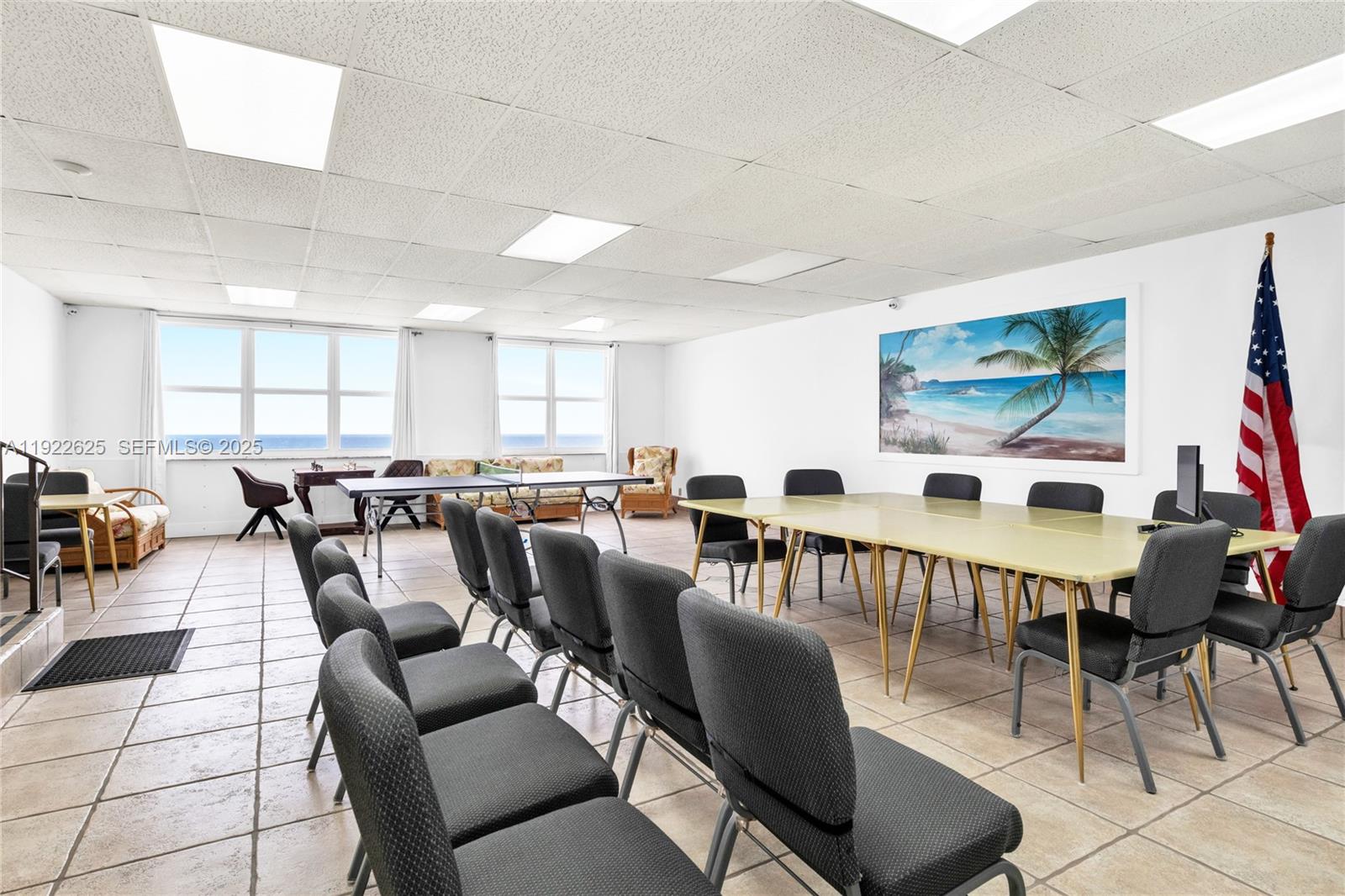 400 North Surf Road, Unit 506 Hollywood, FL 33019 - Photo 29 of 37 a living room with lots of furniture and a large window