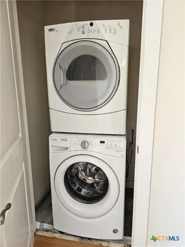 a swimming pool with outdoor seating and yard