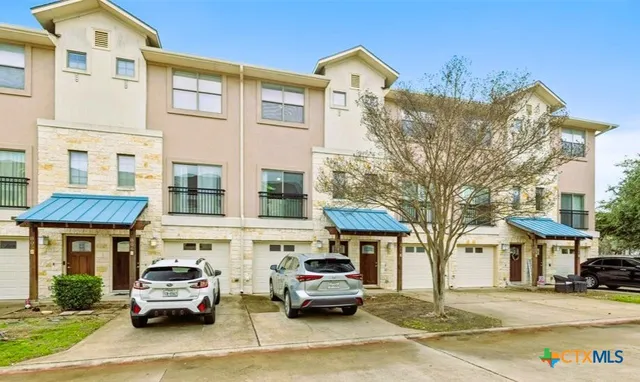 a car parked in front of a house