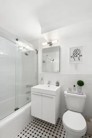 a kitchen with a stove and a microwave