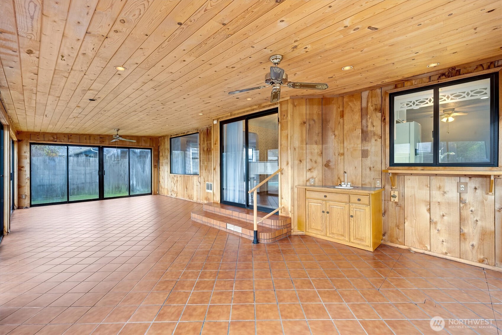 2727 Hemlock Street Longview, WA 98632 - Photo 14 of 40 a view of empty room with wooden floor and fan