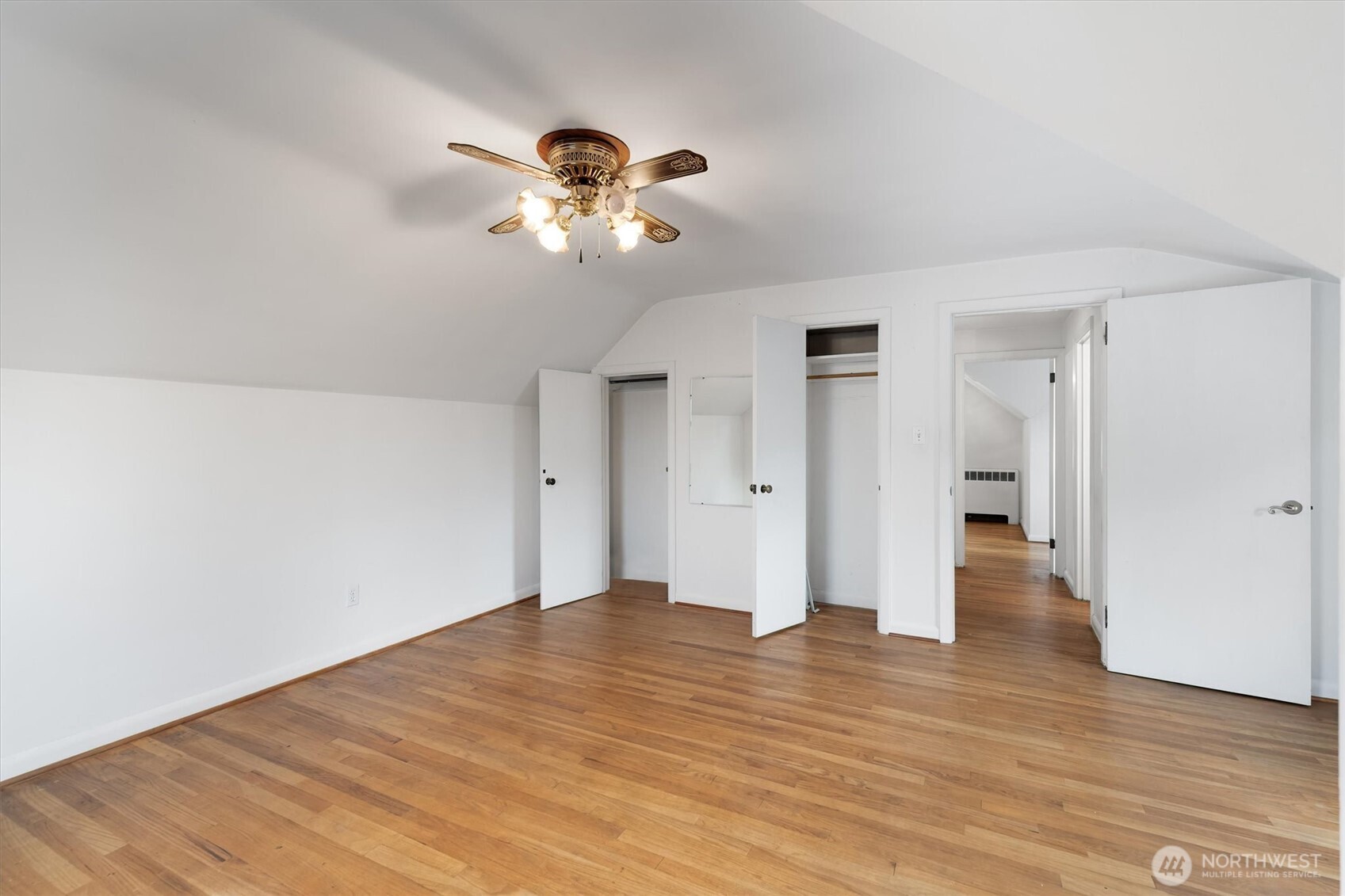 2727 Hemlock Street Longview, WA 98632 - Photo 22 of 40 a view of an empty room with wooden floor