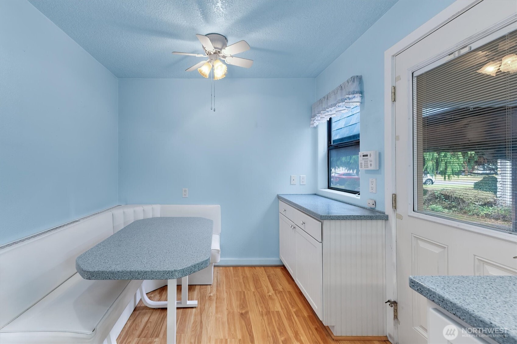 2727 Hemlock Street Longview, WA 98632 - Photo 6 of 40 a bathroom with a granite countertop sink a toilet a mirror and vanity
