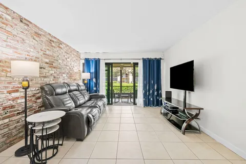 a bedroom with furniture and windows