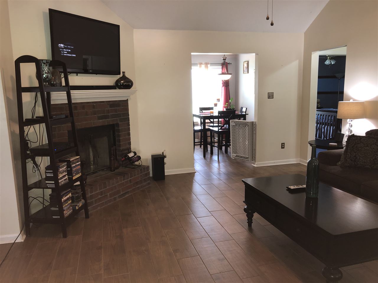5509 Edwin Forest Road Memphis, TN 38141 - Photo 5 of 19 a living room with furniture and a fireplace