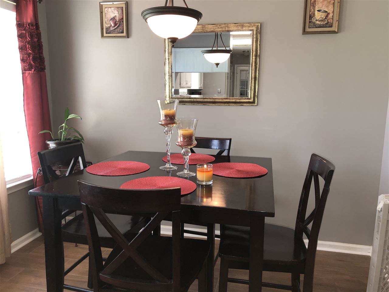 5509 Edwin Forest Road Memphis, TN 38141 - Photo 8 of 19 a view of a dining room with furniture and wooden floor