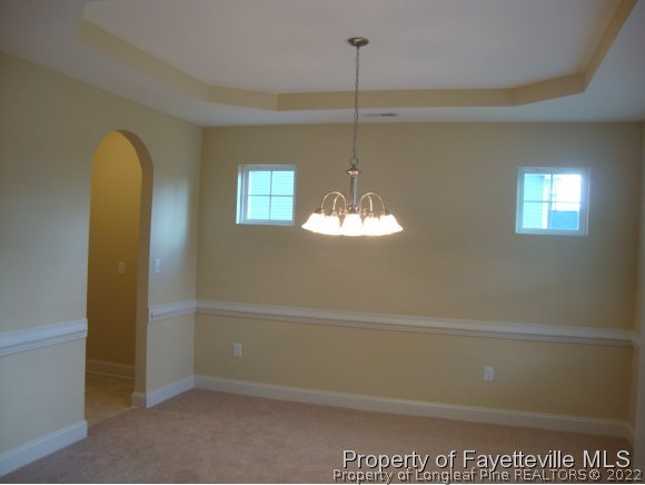 717 Sun Road Aberdeen, NC 28315 - Photo 7 of 14 a view of a decorative light in a room