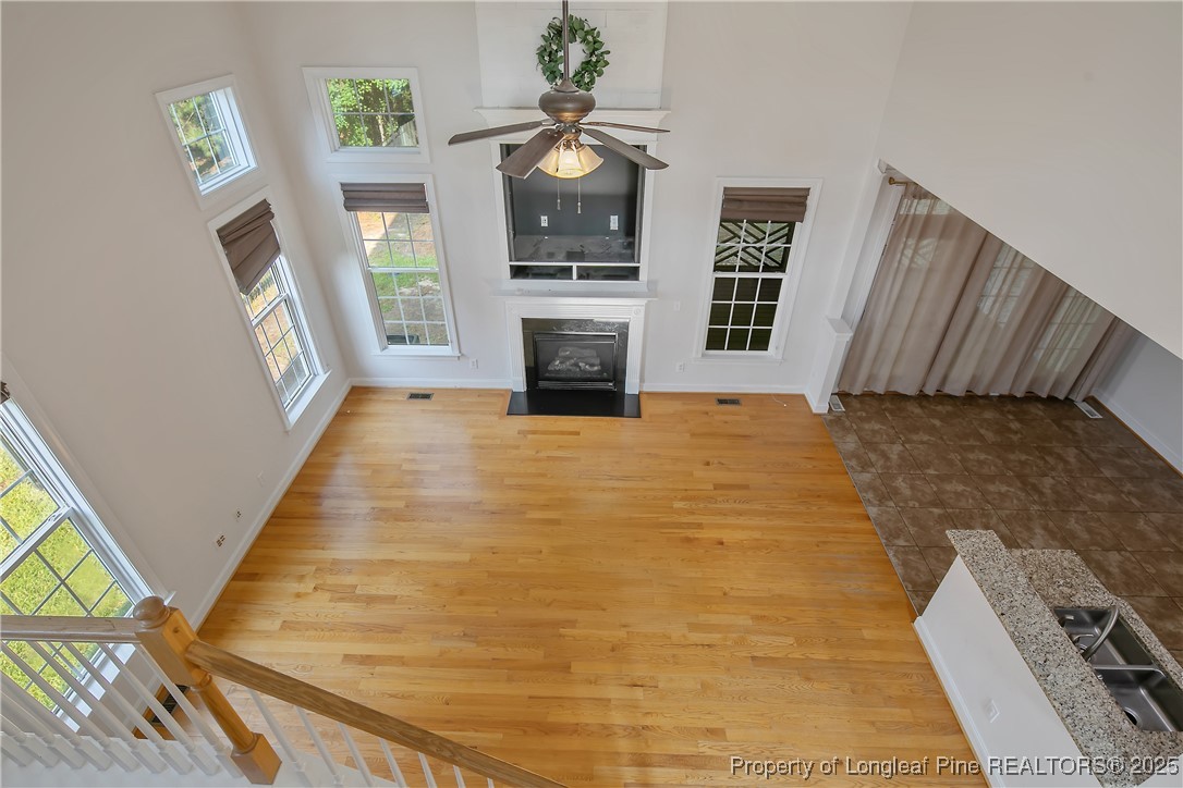 399 Falling Water Road Spring Lake, NC 28390 - Photo 35 of 50 a view of an empty room with window and fireplace