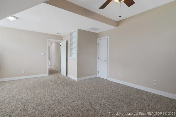 a view of a room with wooden floor and balcony