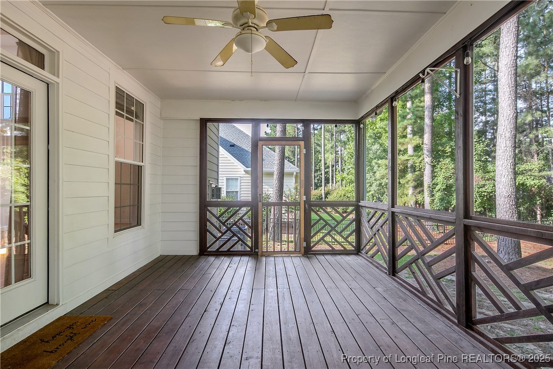 399 Falling Water Road Spring Lake, NC 28390 - Photo 47 of 50 a view of a room with wooden floor and balcony