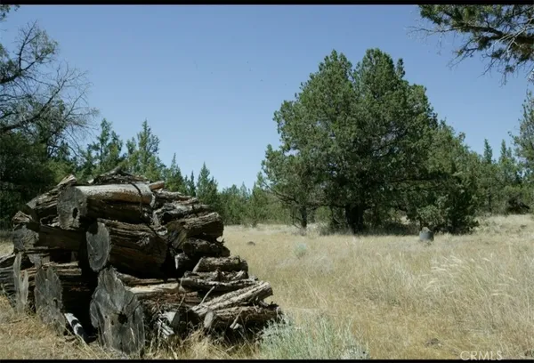 a view of a building in a field