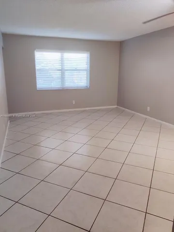 a view of a room and window