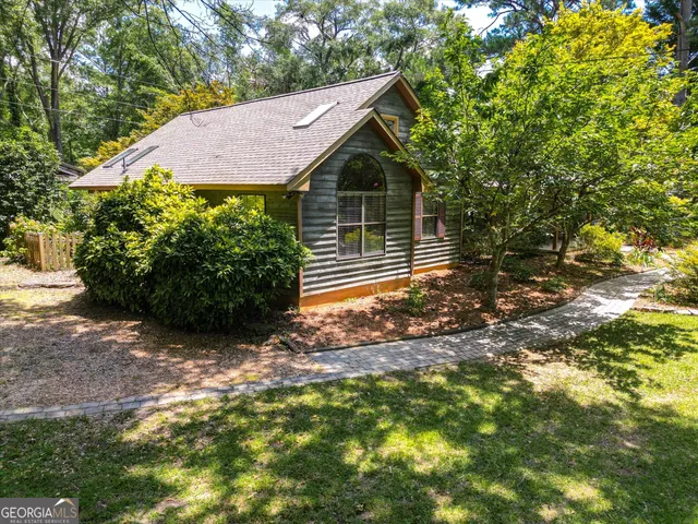 a kitchen with a stove and a refrigerator