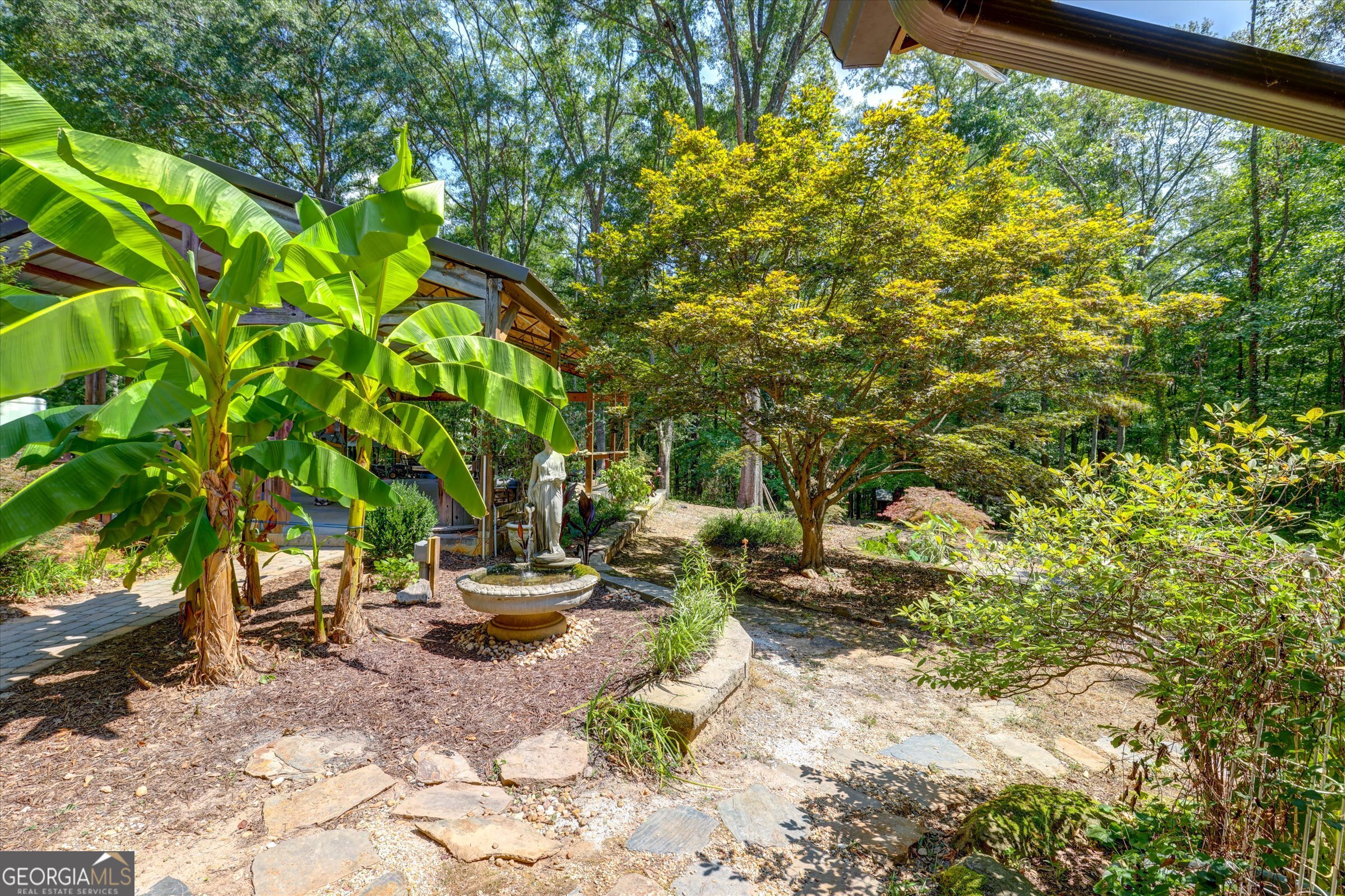 424 Hampton Road Hampton, GA 30228 - Photo 28 of 96 a view of a tree in front of a house