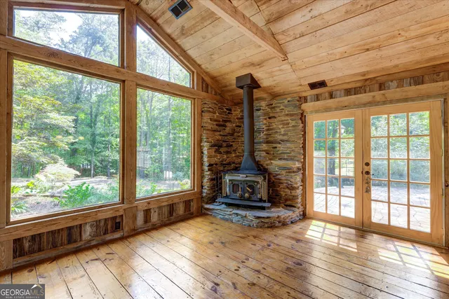 a view of an empty room with a window