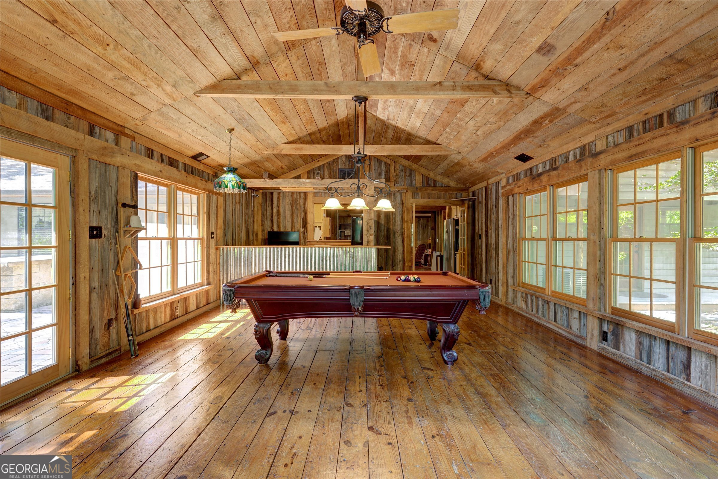 424 Hampton Road Hampton, GA 30228 - Photo 32 of 96 a outdoor space with wooden floor and furniture