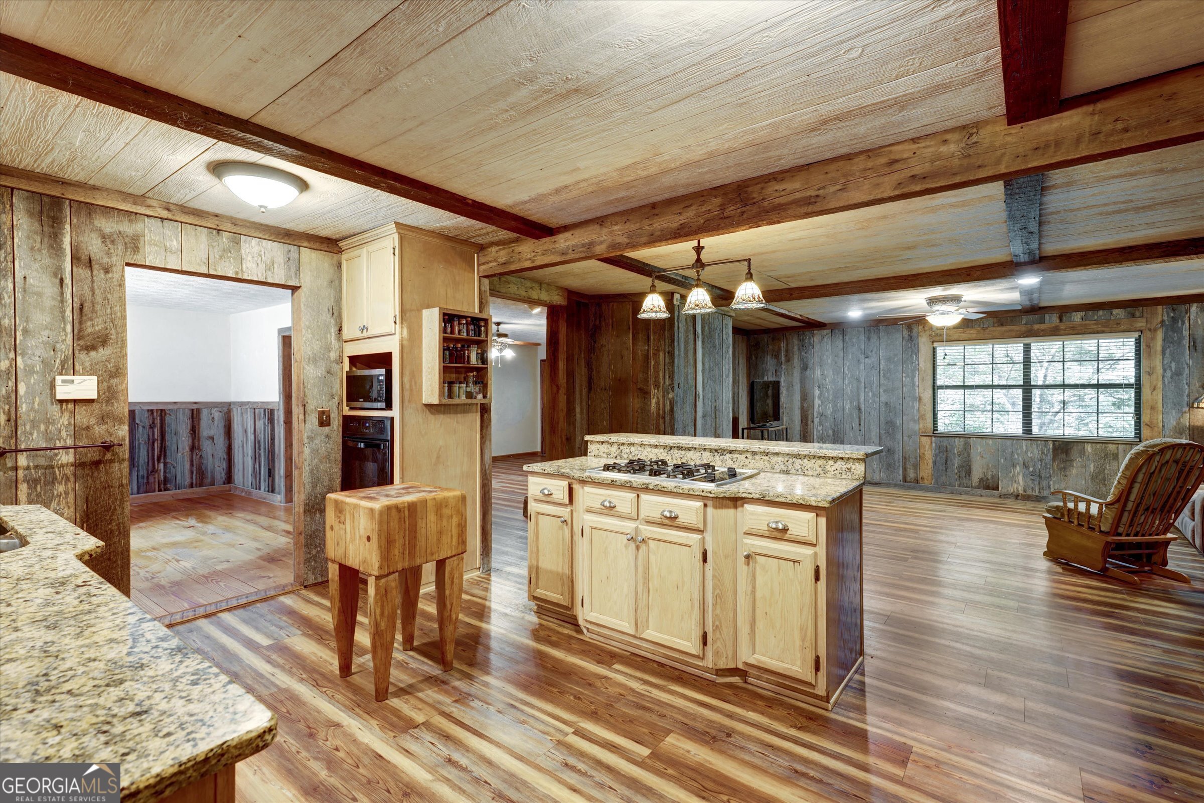 424 Hampton Road Hampton, GA 30228 - Photo 35 of 96 a kitchen with a stove and cabinets