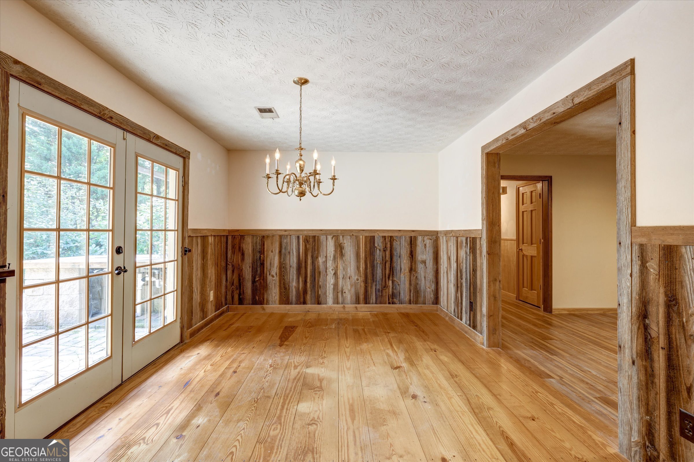 424 Hampton Road Hampton, GA 30228 - Photo 43 of 96 a view of a room with wooden floor and windows