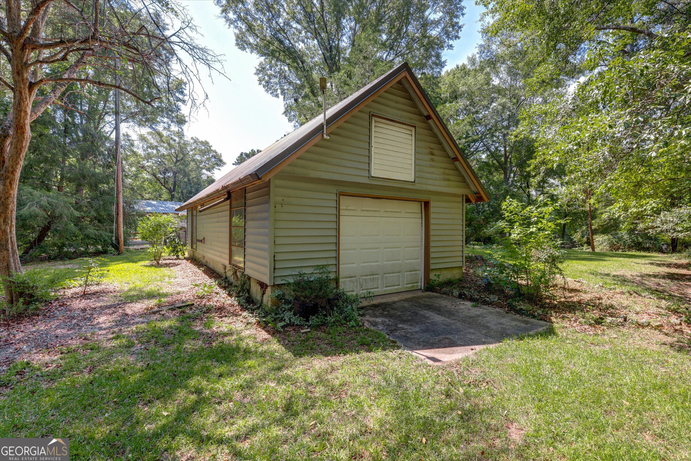 424 Hampton Road Hampton, GA 30228 - Photo 72 of 96 a view of backyard of house with wooden fence