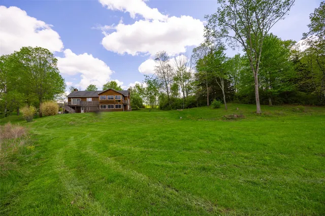 a view of a backyard with a garden