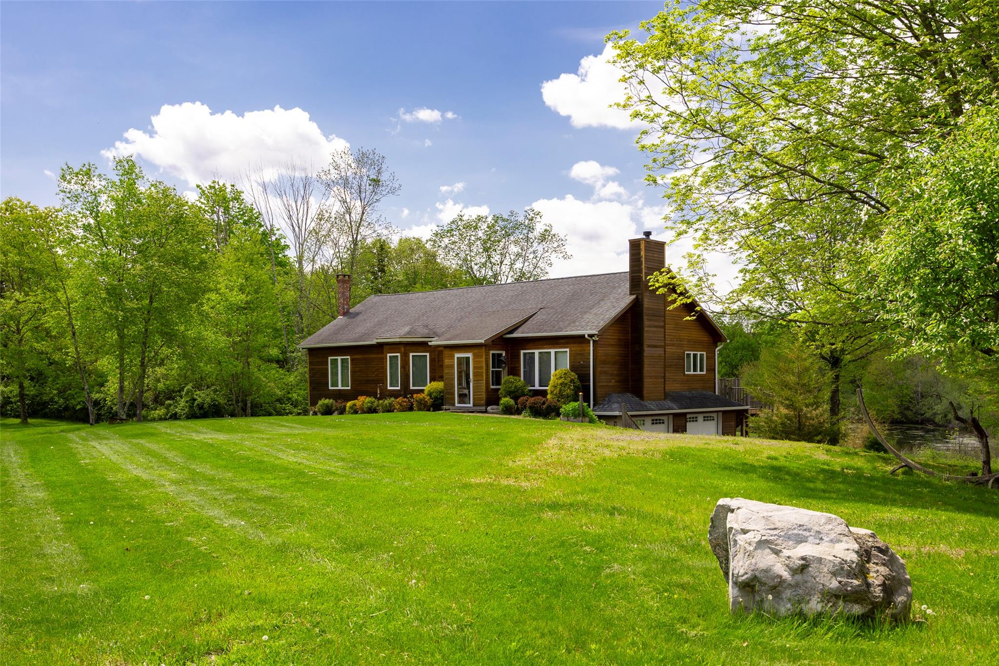 508 Woodstock Road Millbrook, NY 12545 - Photo 33 of 46 a front view of a house with garden