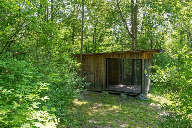 a view of a porch with a yard