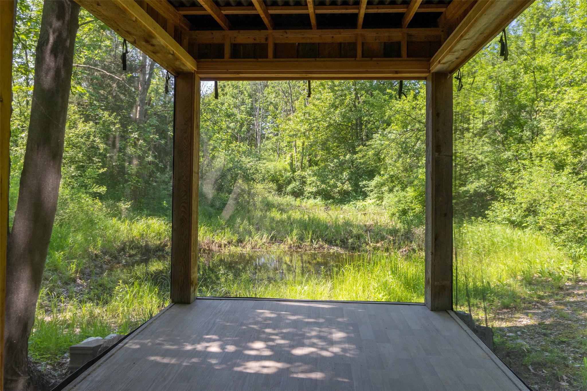 508 Woodstock Road Millbrook, NY 12545 - Photo 38 of 46 a view of a porch with a yard