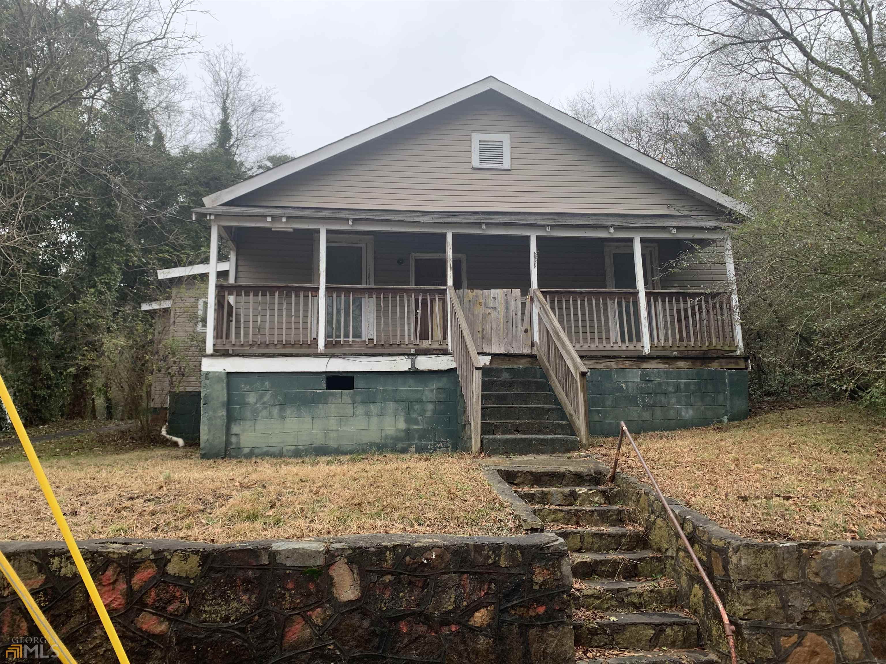 103 East Glover Street Rome, GA 30161 - Photo 1 of 1 a front view of a house with garden