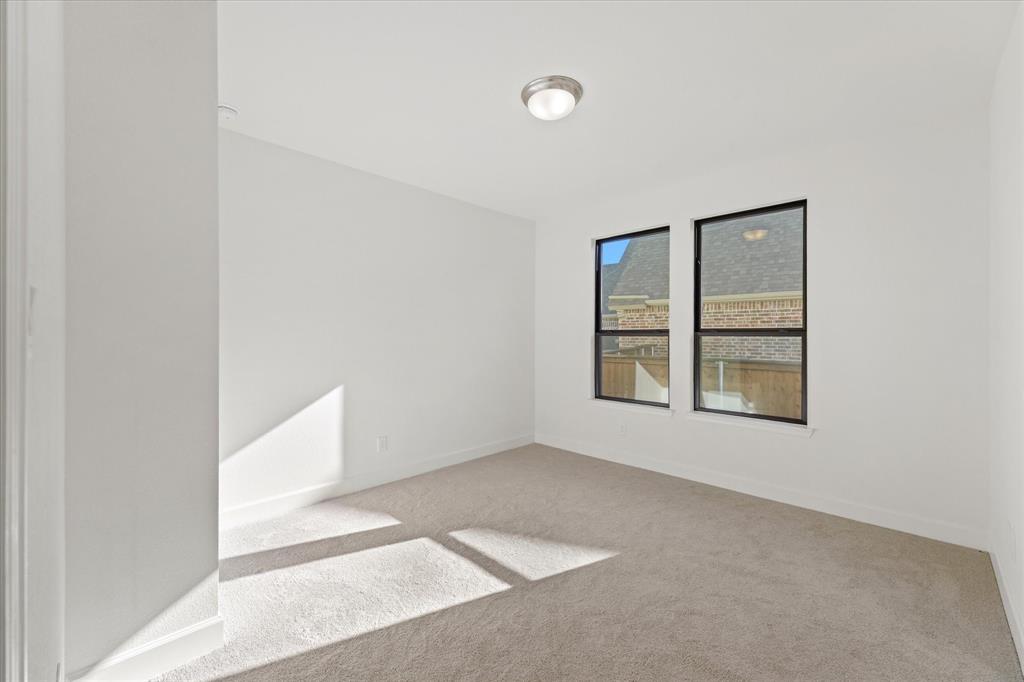 4626 Rillstone Road Midlothian, TX 76065 - Photo 21 of 40 Carpeted empty room with baseboards