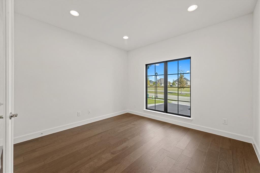 4626 Rillstone Road Midlothian, TX 76065 - Photo 24 of 40 Spare room with recessed lighting and dark wood finished floors
