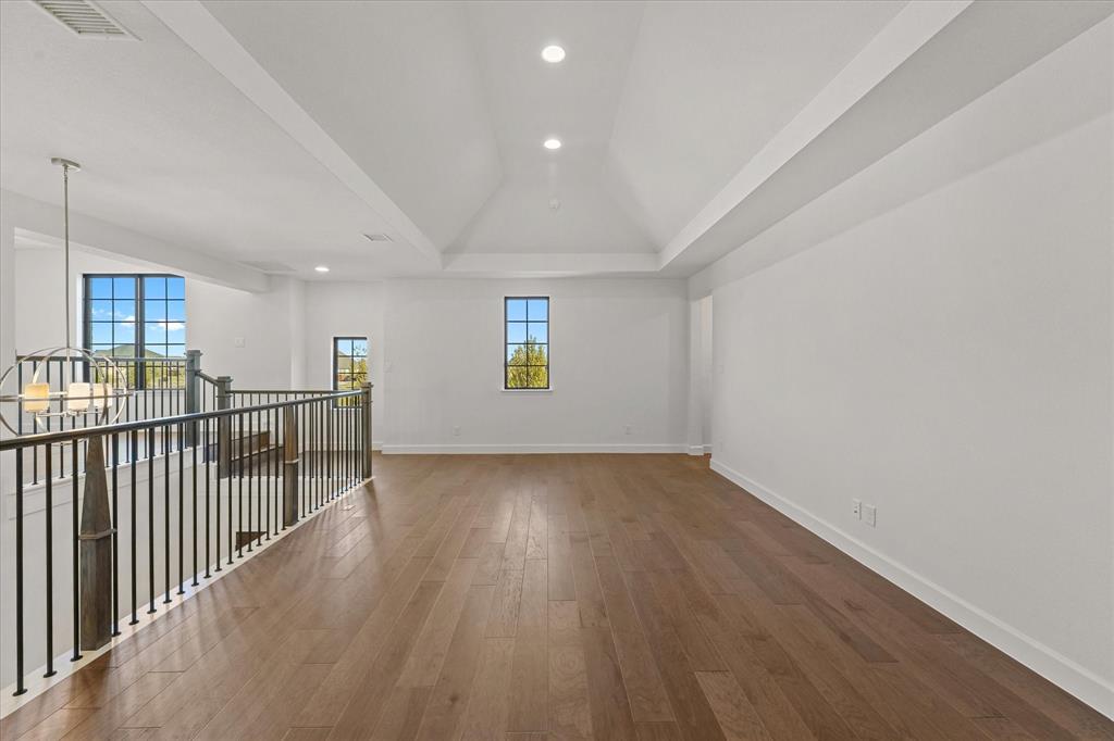 4626 Rillstone Road Midlothian, TX 76065 - Photo 25 of 40 Additional living space with recessed lighting, wood finished floors, a chandelier, and vaulted ceiling