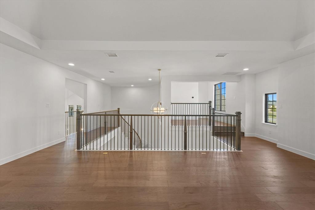 4626 Rillstone Road Midlothian, TX 76065 - Photo 26 of 40 Unfurnished room featuring recessed lighting, a chandelier, and hardwood / wood-style flooring