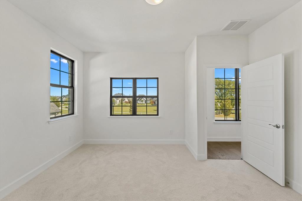 4626 Rillstone Road Midlothian, TX 76065 - Photo 28 of 40 Unfurnished room featuring light carpet and baseboards
