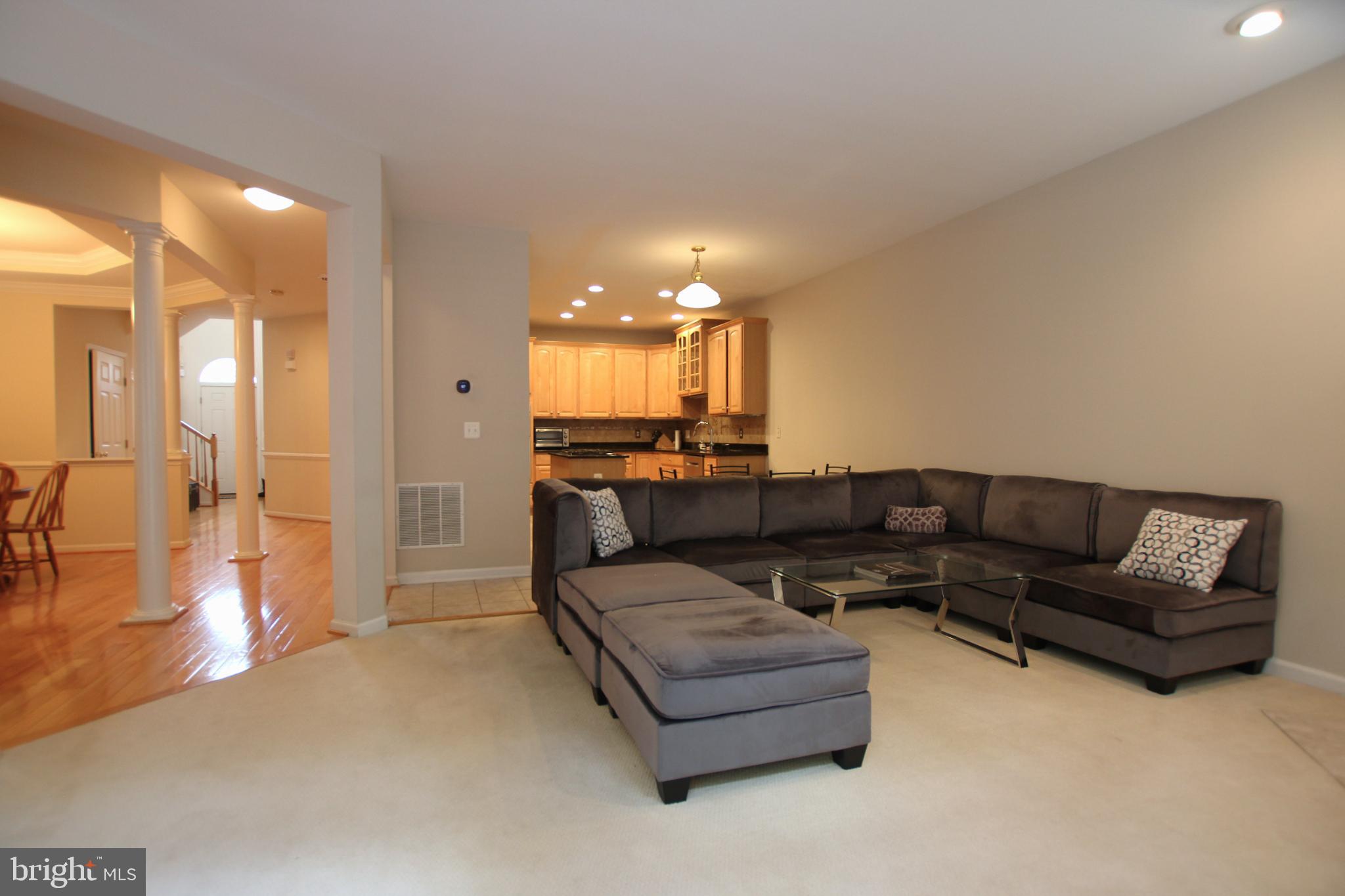8532 Barrow Furnace Lane Lorton, VA 22079 - Photo 12 of 33 a living room with furniture and a large window