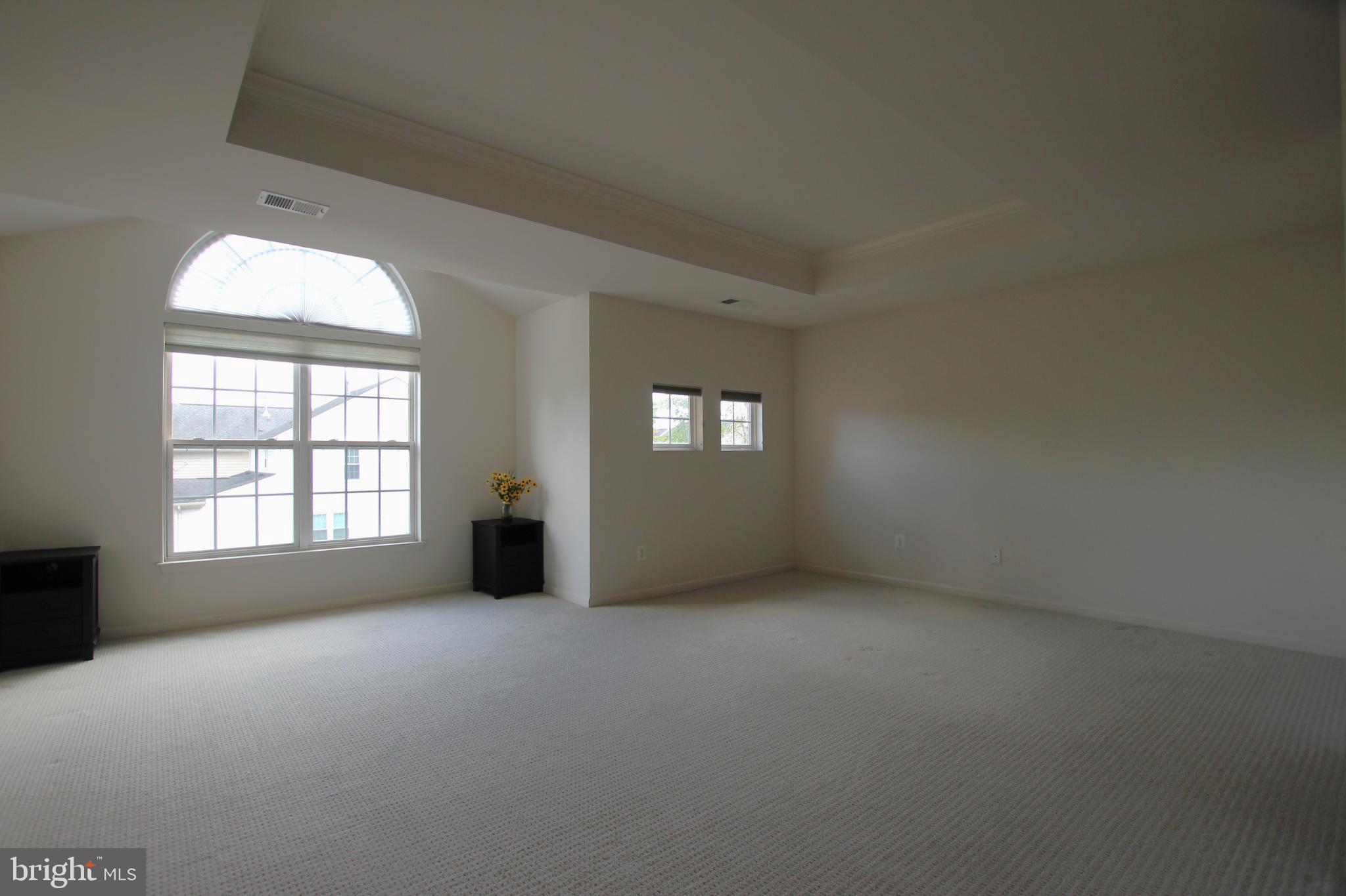 8532 Barrow Furnace Lane Lorton, VA 22079 - Photo 17 of 33 an empty room with windows