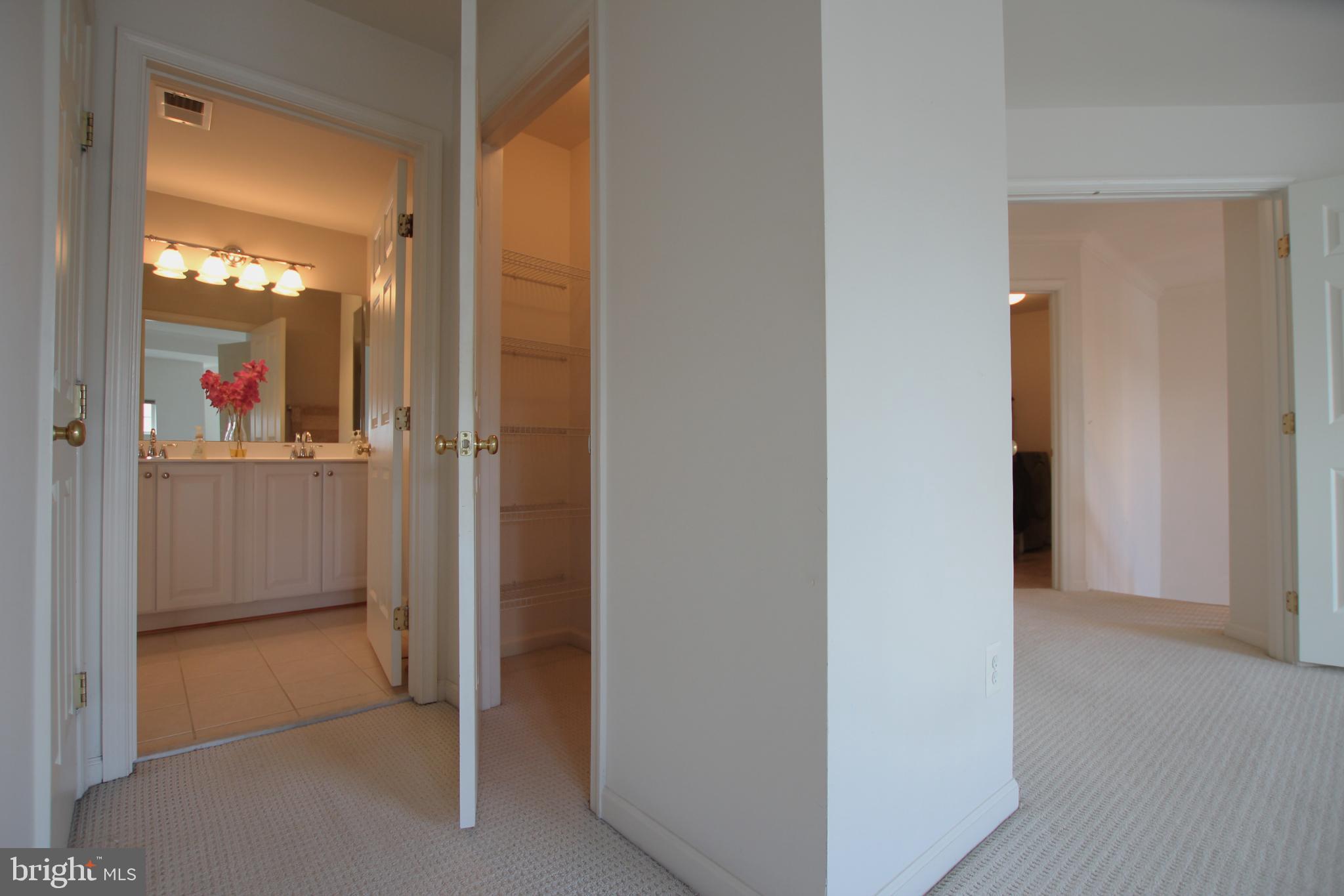 8532 Barrow Furnace Lane Lorton, VA 22079 - Photo 18 of 33 a view of a bathroom from a hallway