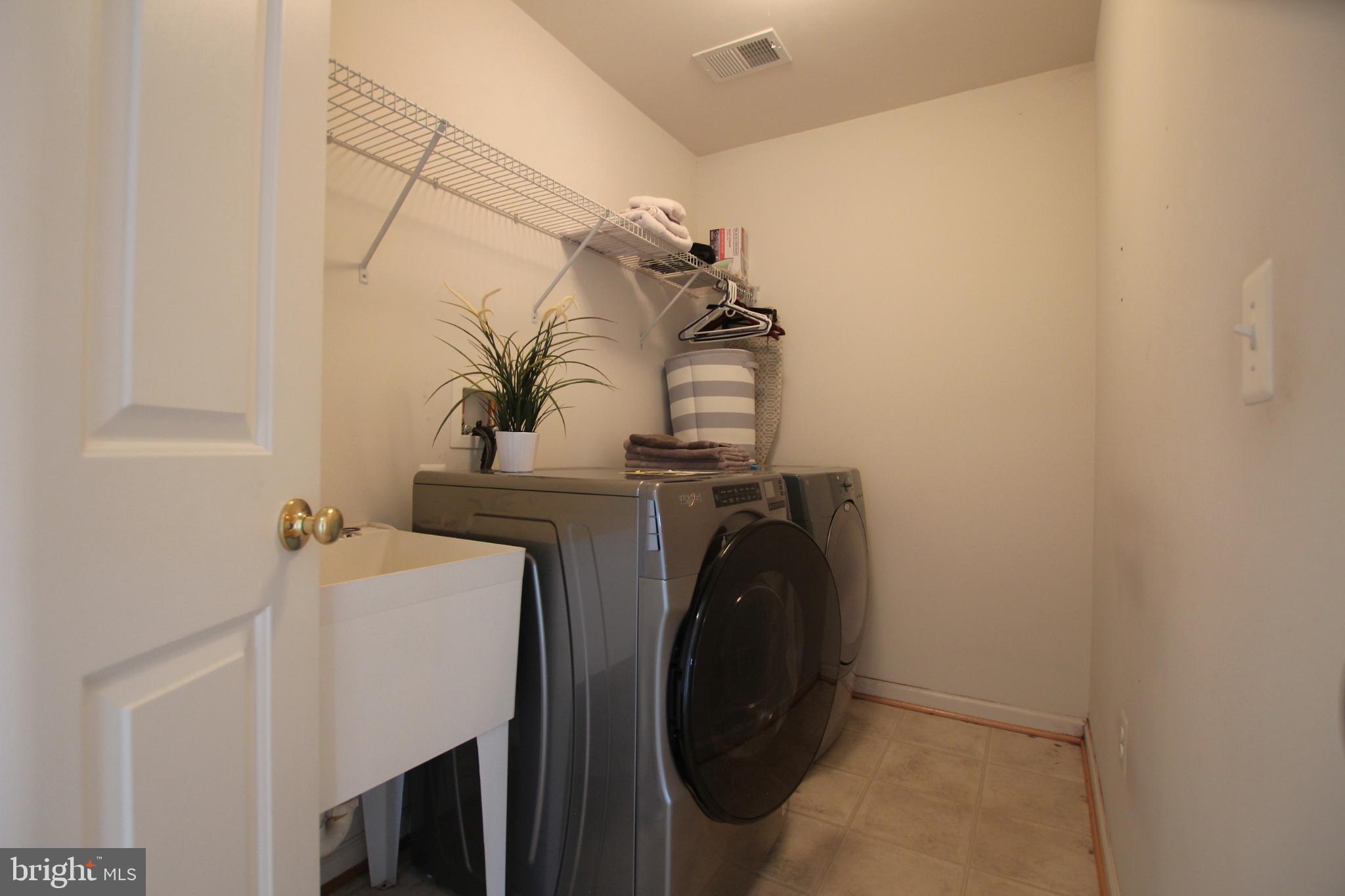 8532 Barrow Furnace Lane Lorton, VA 22079 - Photo 20 of 33 a utility room with dryer and washer