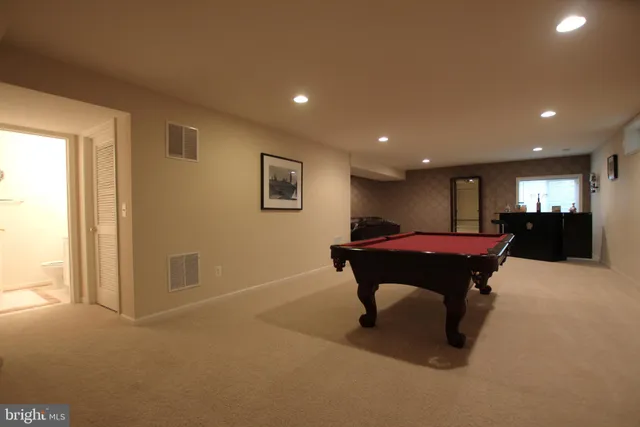 a living room with furniture a table and a window