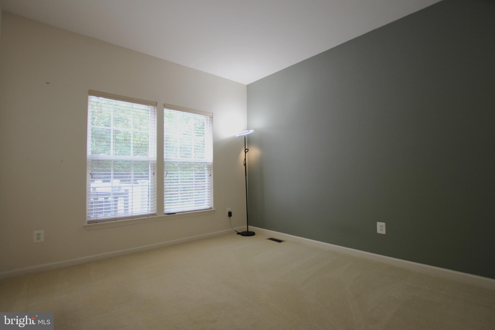 8532 Barrow Furnace Lane Lorton, VA 22079 - Photo 6 of 33 an empty room with a window