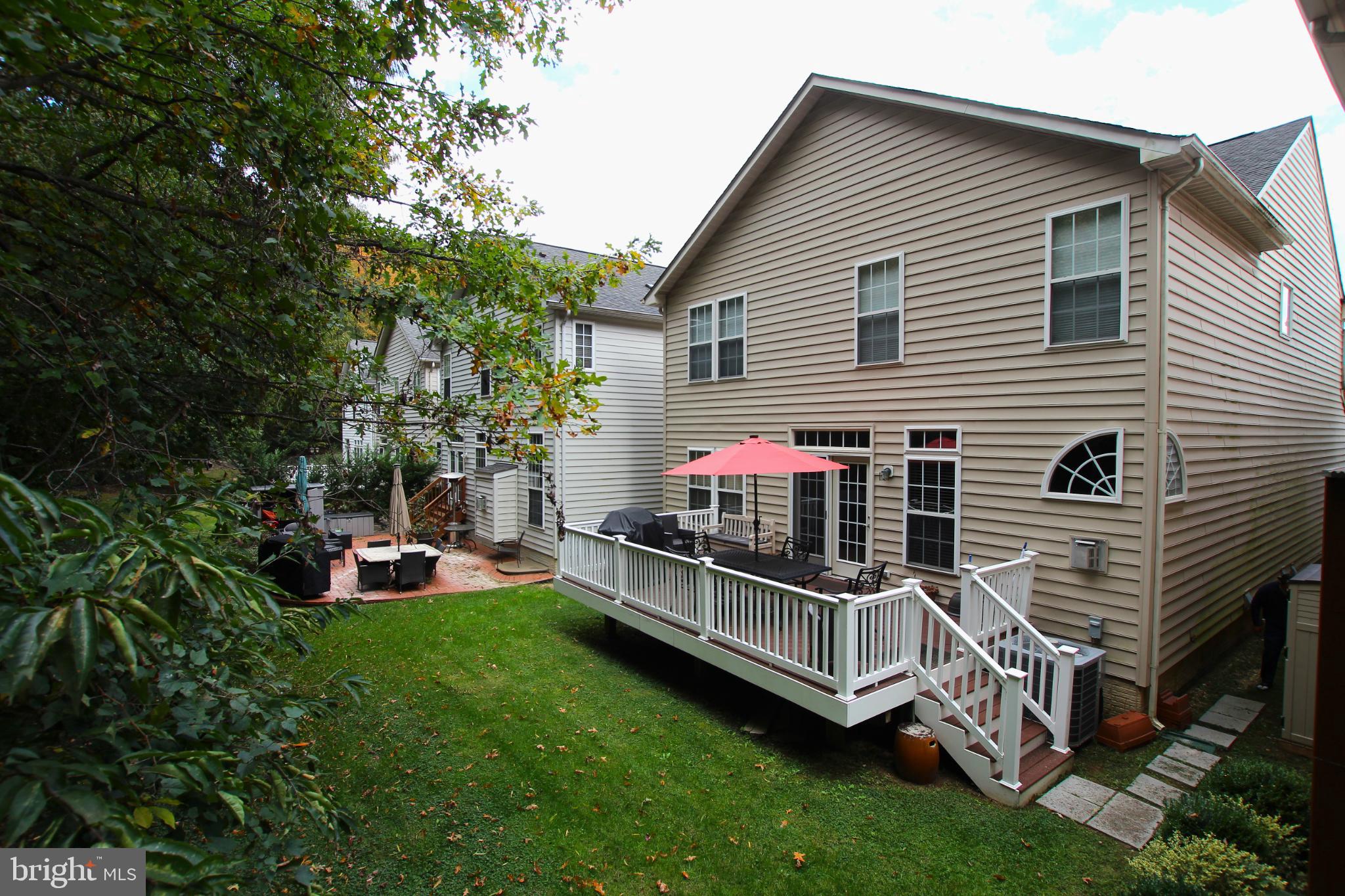 8532 Barrow Furnace Lane Lorton, VA 22079 - Photo 9 of 33 a view of a house with a yard and furniture
