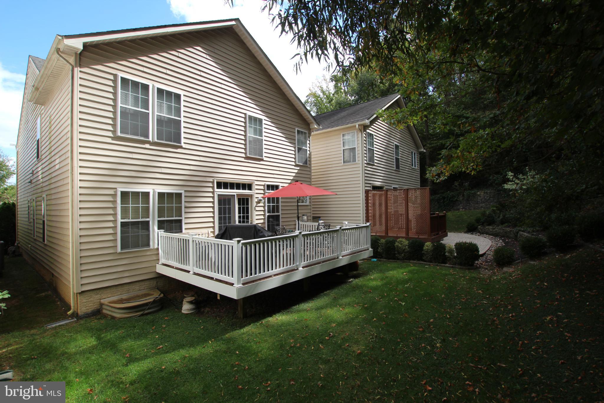 8532 Barrow Furnace Lane Lorton, VA 22079 - Photo 10 of 33 a view of backyard with deck and garden