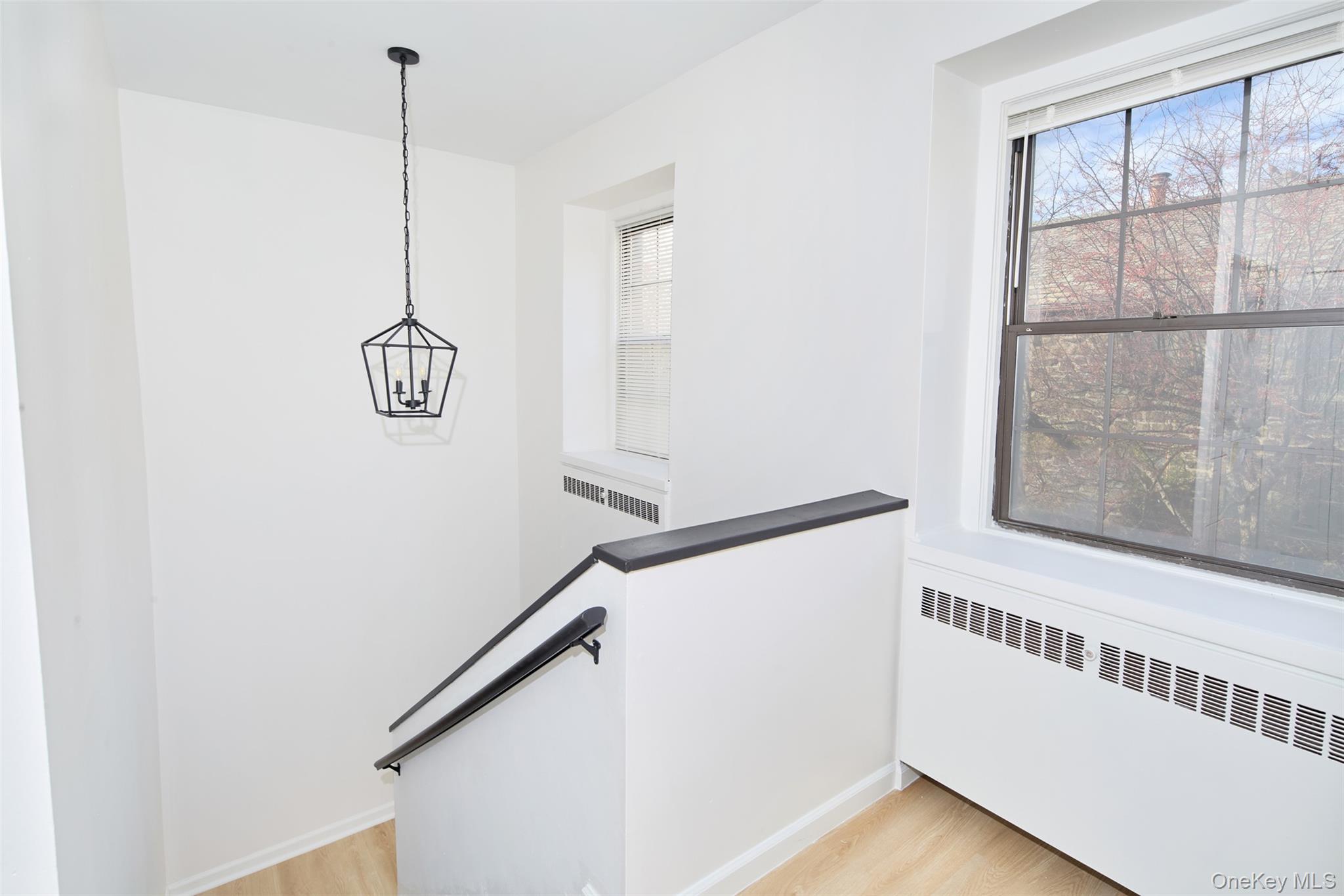 341 Furnace Dock Road, Unit 35 Cortlandt Manor, NY 10567 - Photo 16 of 25 a view of a hallway with stairs