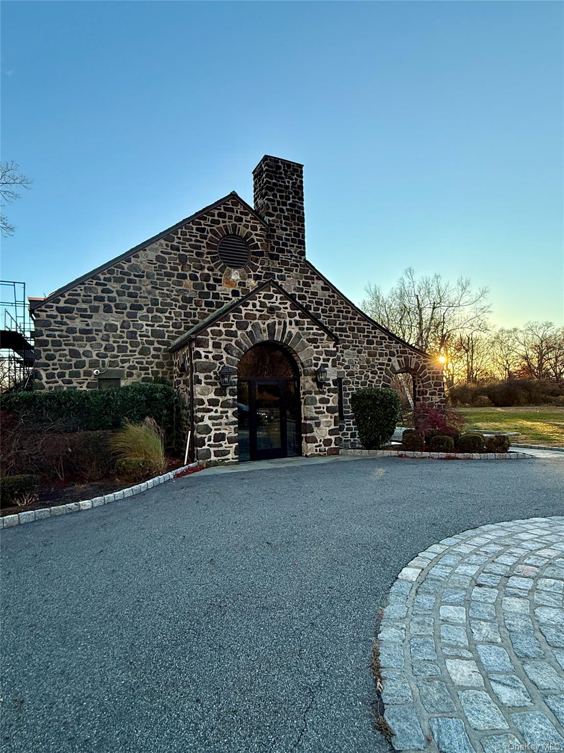 341 Furnace Dock Road, Unit 35 Cortlandt Manor, NY 10567 - Photo 23 of 25 a front view of a house with a yard