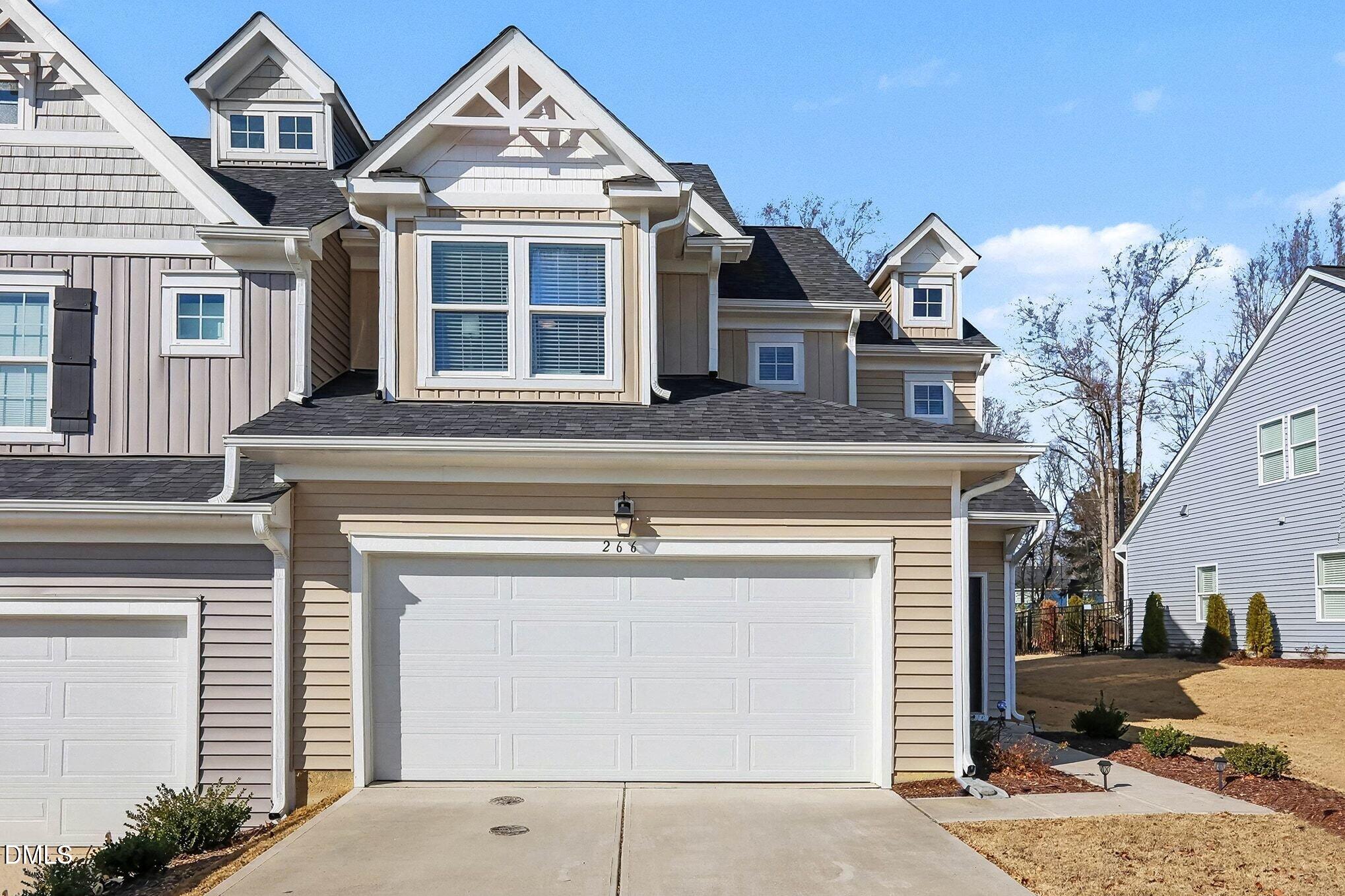 266 Shingle Oak Road Wake Forest, NC 27587 - Photo 15 of 36 a front view of a house with a yard